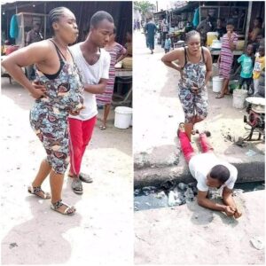 Love Or Madness? Man Lies On A Gutter For His Pregnant Wife To Pass